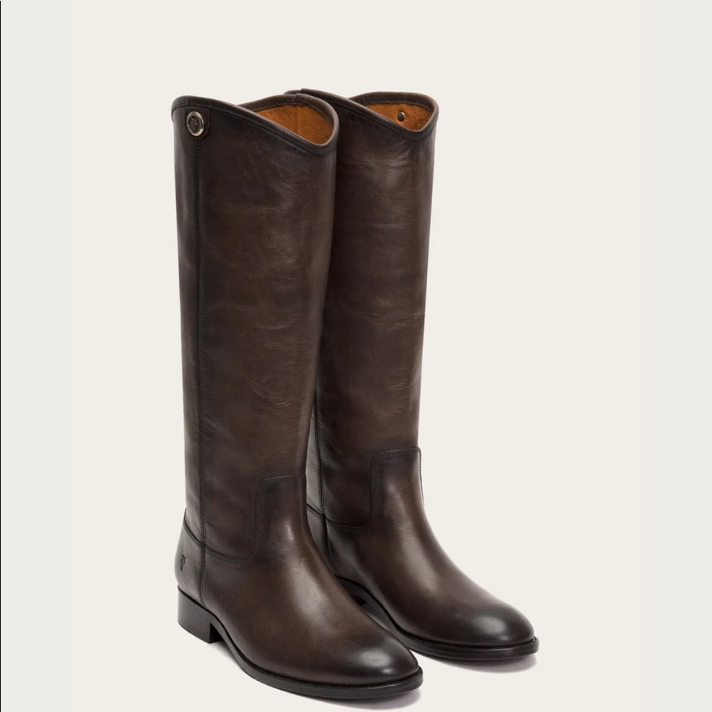 Frye Melissa Button 2. Made from leather in a pull-on design.